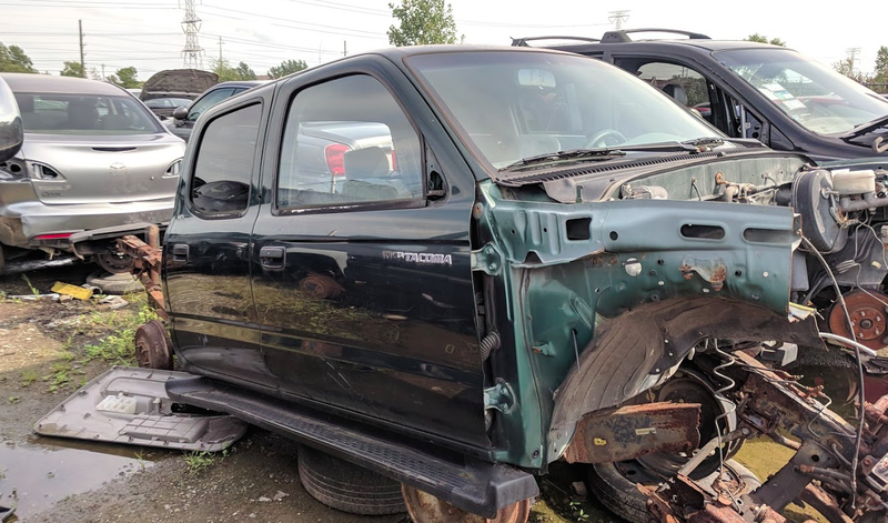 Illustration for article titled Look At This Totally Rusted-Out Toyota Tacoma